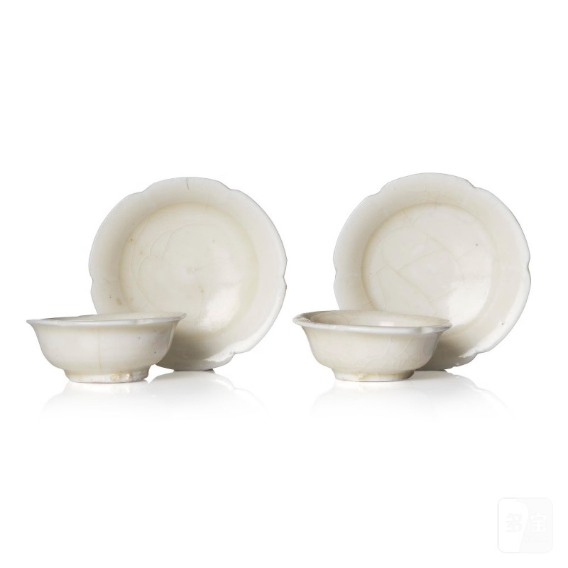 A group of four small ding flori-formed dishes,